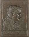 Group of bas-relief plaques and bookends depicting Theodore Roosevelt and his home.